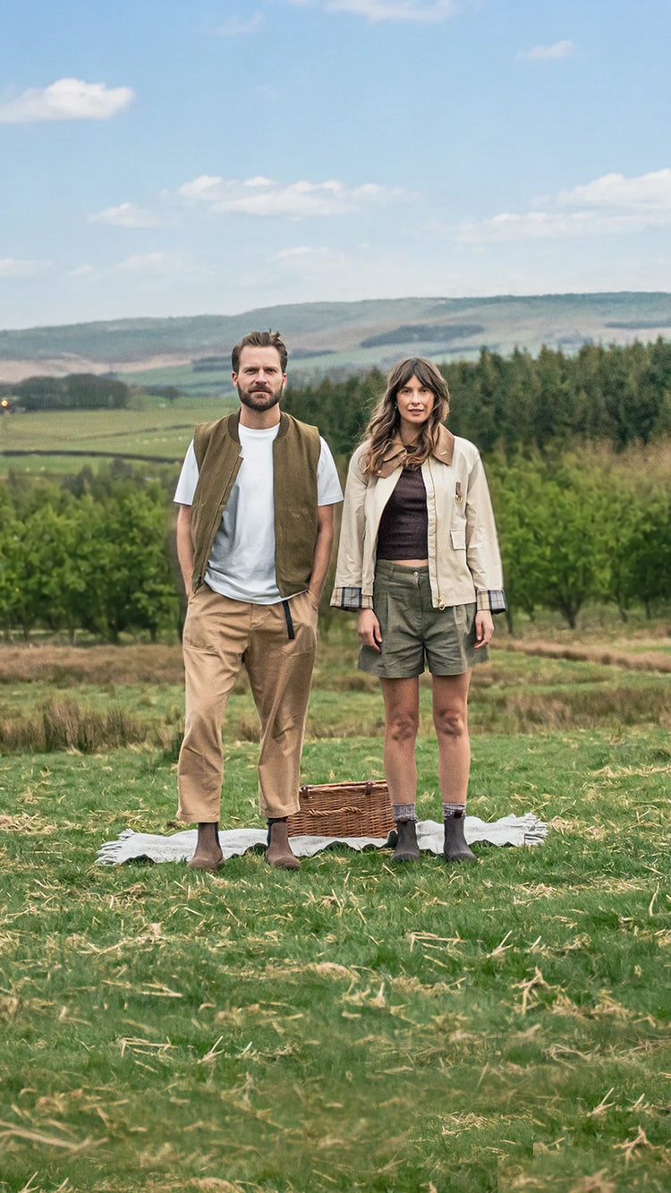 two people a man and a woman wearing country casual clothing and LANX shoes